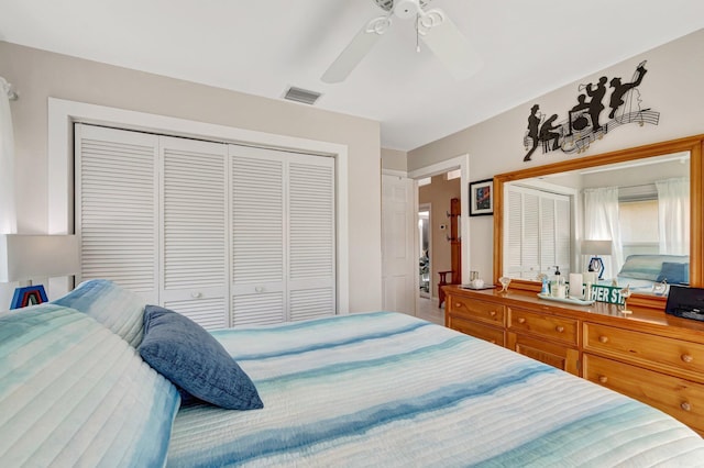 6089 Bay Isles Dr, Boynton Beach, FL 33437 - bedroom featuring visible vents, a closet, and ceiling fan