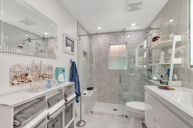 6089 Bay Isles Dr, Boynton Beach, FL 33437 - full bathroom with visible vents, toilet, recessed lighting, a marble finish shower, and vanity