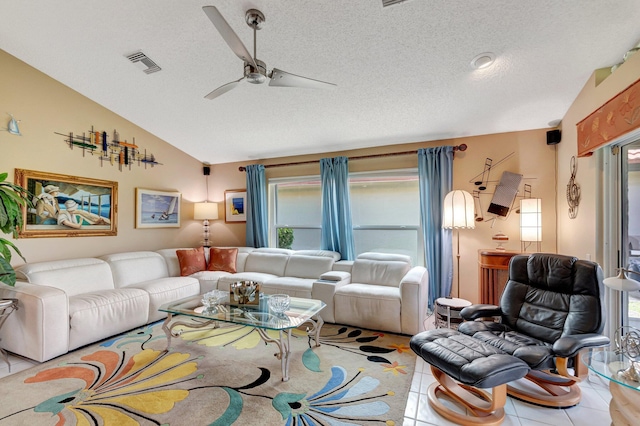 6089 Bay Isles Dr, Boynton Beach, FL 33437 - living room with visible vents, a ceiling fan, a textured ceiling, tile patterned flooring, and vaulted ceiling