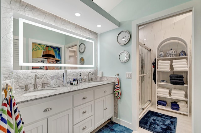 6089 Bay Isles Dr, Boynton Beach, FL 33437 - bathroom featuring decorative backsplash, a stall shower, and a sink