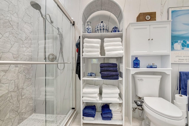 6089 Bay Isles Dr, Boynton Beach, FL 33437 - bathroom featuring toilet and a marble finish shower
