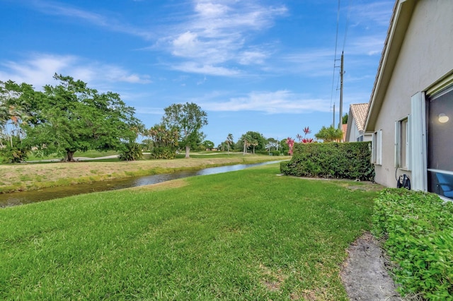 6089 Bay Isles Dr, Boynton Beach, FL 33437 - view of yard featuring a water view
