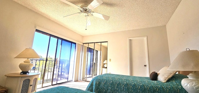 335 S Waverly Pl Unit 7A, Vero Beach, FL 32960 - bedroom featuring a textured ceiling, a ceiling fan, and access to outside