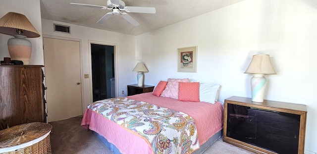 335 S Waverly Pl Unit 7A, Vero Beach, FL 32960 - carpeted bedroom with visible vents, a textured ceiling, and ceiling fan