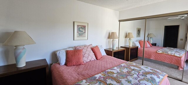335 S Waverly Pl Unit 7A, Vero Beach, FL 32960 - carpeted bedroom with a closet and a textured ceiling
