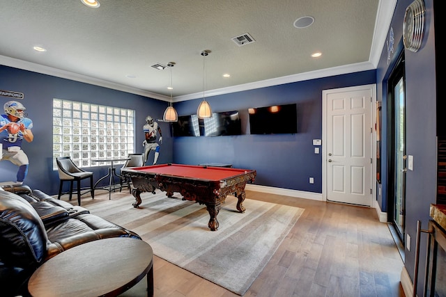 recreation room with visible vents, billiards, crown molding, and wood finished floors