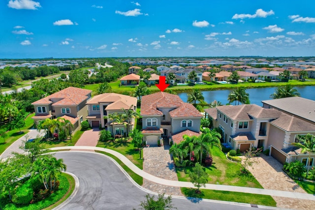 aerial view featuring a residential view and a water view