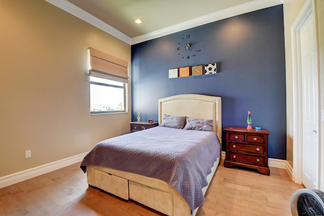 bedroom with crown molding, recessed lighting, wood finished floors, and baseboards