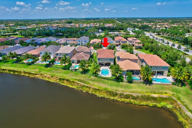 aerial view featuring a residential view and a water view