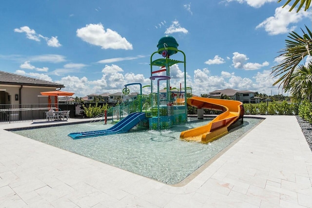 community play area featuring fence