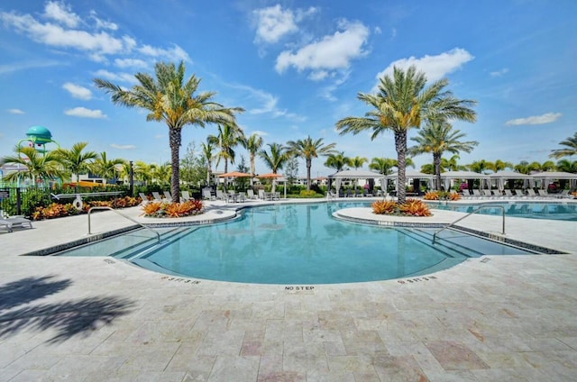 pool featuring a patio area