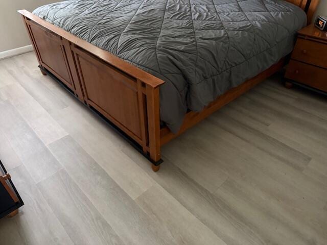 bedroom featuring light wood-style floors