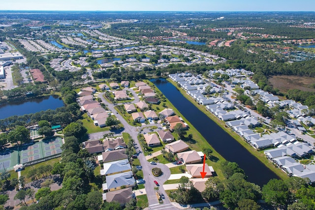 bird's eye view with a residential view and a water view