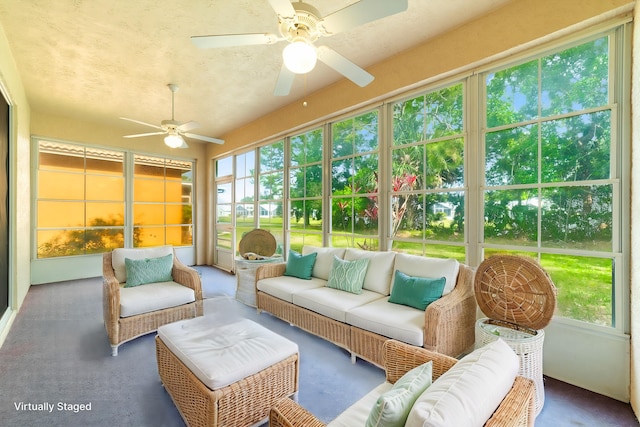 sunroom with ceiling fan