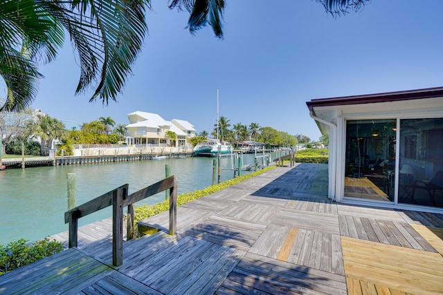 dock area featuring a water view