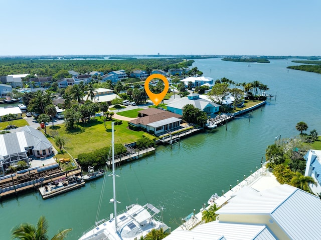 birds eye view of property featuring a residential view and a water view