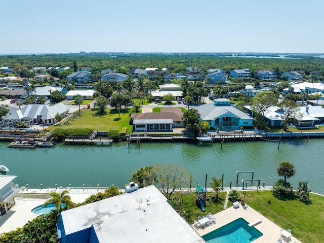 aerial view featuring a residential view and a water view