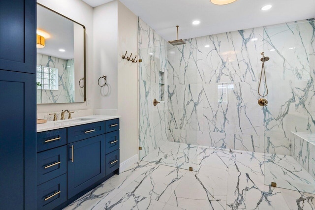 bathroom with vanity, recessed lighting, marble finish floor, and a marble finish shower