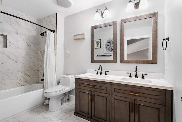 full bathroom with a sink, toilet, marble finish floor, and shower / bath combo