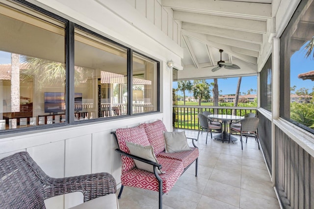 168 Brackenwood Rd, Palm Beach Gardens, FL 33418 - sunroom with lofted ceiling with beams and ceiling fan