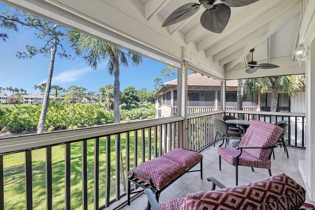 168 Brackenwood Rd, Palm Beach Gardens, FL 33418 - sunroom featuring ceiling fan and vaulted ceiling with beams