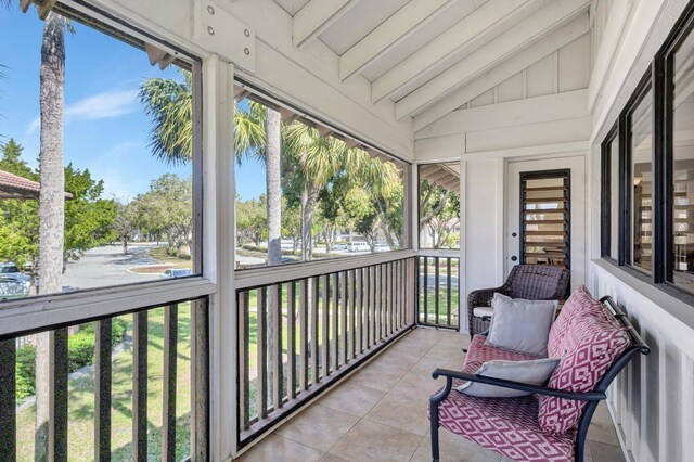 168 Brackenwood Rd, Palm Beach Gardens, FL 33418 - sunroom / solarium featuring lofted ceiling with beams