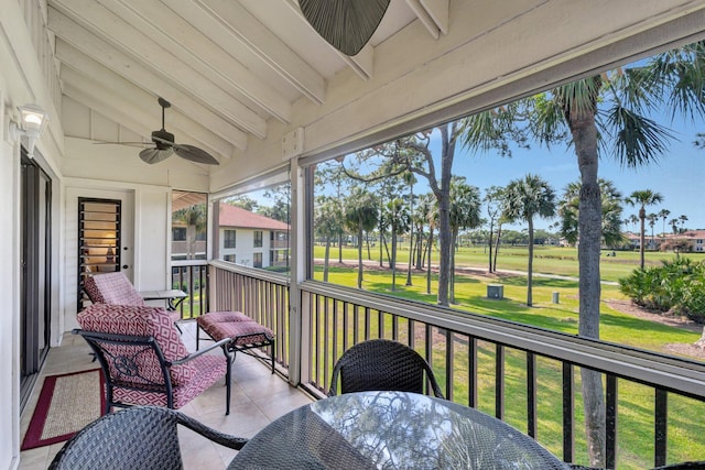 168 Brackenwood Rd, Palm Beach Gardens, FL 33418 - sunroom with vaulted ceiling with beams and ceiling fan