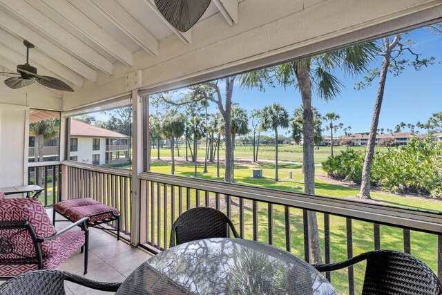 168 Brackenwood Rd, Palm Beach Gardens, FL 33418 - sunroom featuring lofted ceiling with beams and a ceiling fan
