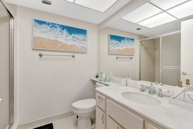 168 Brackenwood Rd, Palm Beach Gardens, FL 33418 - bathroom with vanity, visible vents, a stall shower, tile patterned flooring, and toilet