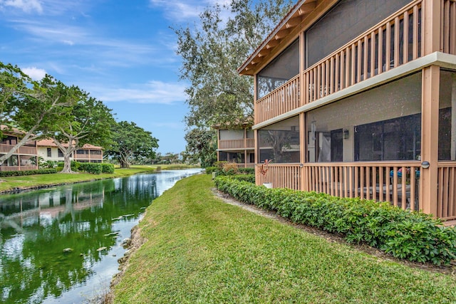 view of yard with a water view