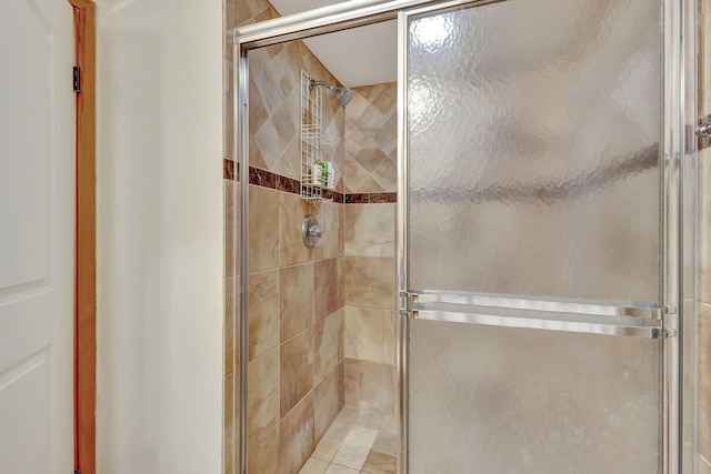 bathroom featuring a shower stall