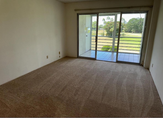 3871 Via Poinciana Unit 302, Lake Worth, FL 33467 - empty room featuring carpet floors