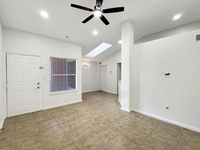 1335 Crystal Way Unit L, Delray Beach, FL 33444 - spare room featuring a skylight, a ceiling fan, lofted ceiling, recessed lighting, and baseboards