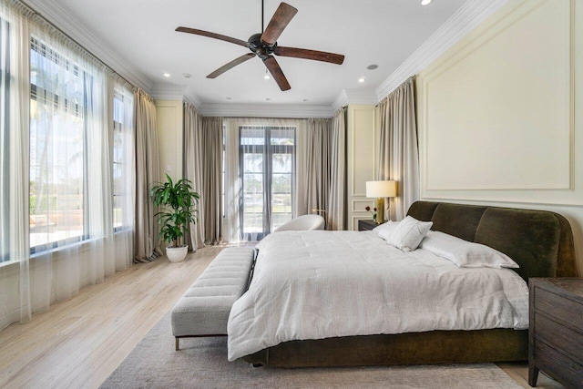 bedroom with recessed lighting, ceiling fan, ornamental molding, access to exterior, and light wood-style floors