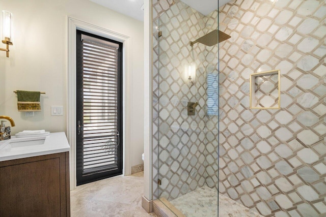 bathroom featuring vanity and walk in shower