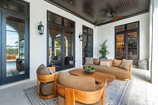 view of patio / terrace featuring french doors and ceiling fan