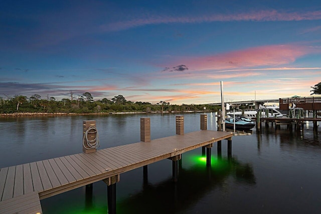 view of dock featuring a water view and boat lift