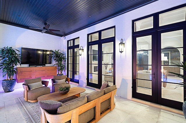 view of patio / terrace with french doors and ceiling fan