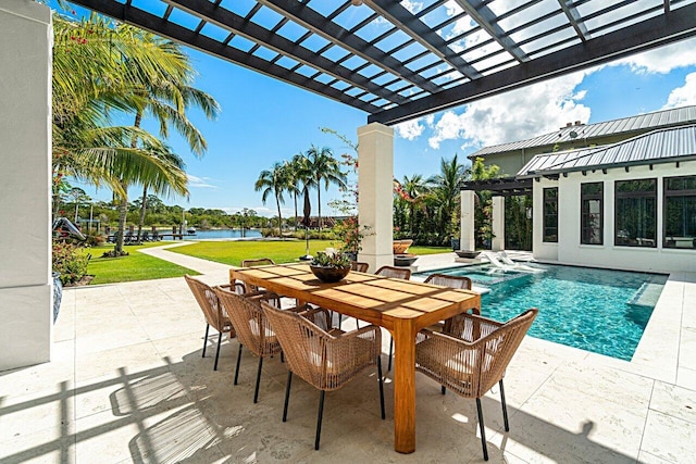 view of swimming pool featuring outdoor dining area, a yard, a pergola, a water view, and a patio area