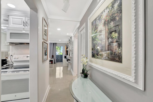 hall with recessed lighting, baseboards, and ornamental molding