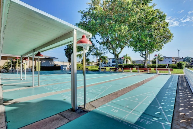 view of home's community with shuffleboard