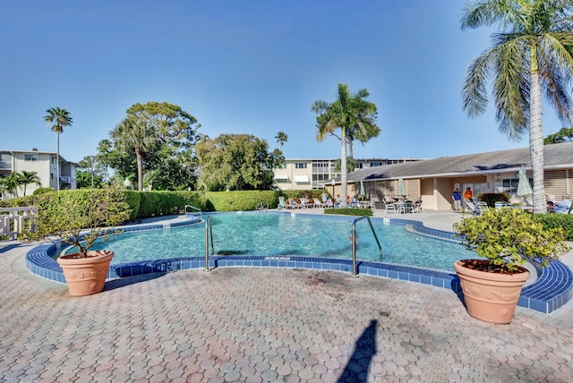 pool with a patio area