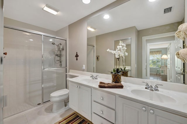 full bathroom featuring tile patterned flooring, a sink, double vanity, and a shower stall