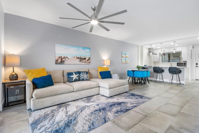 living room featuring a ceiling fan