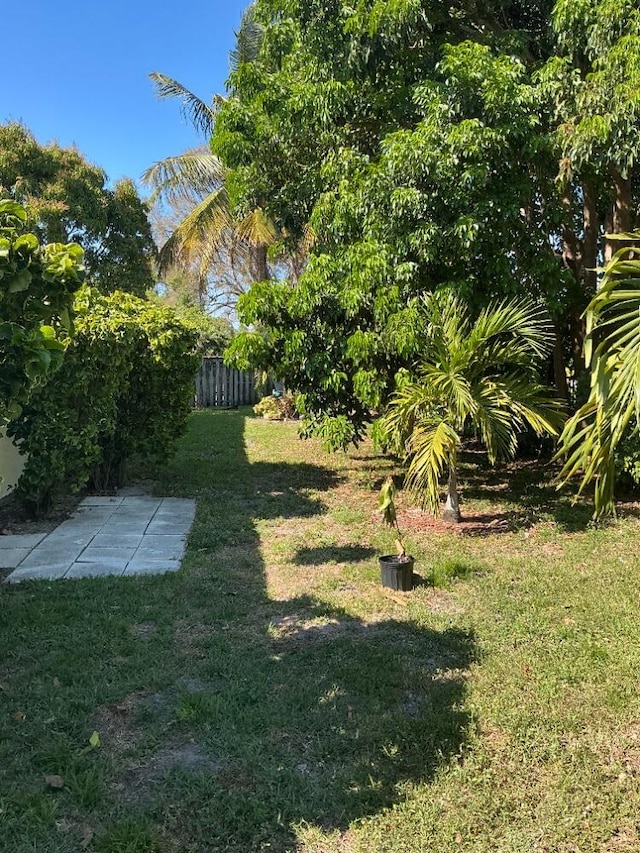 view of yard with fence