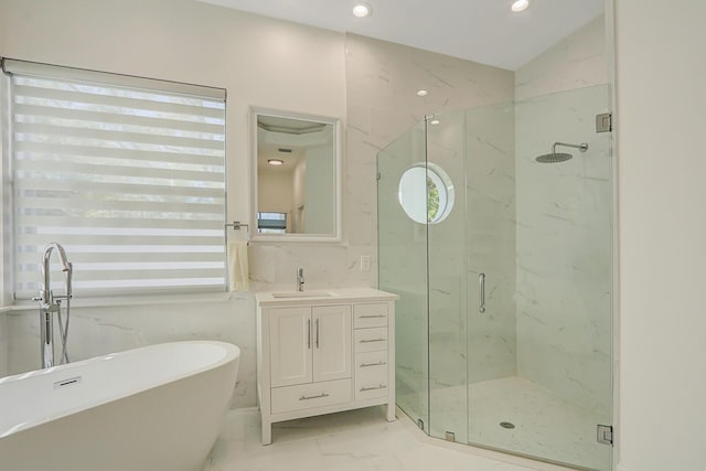 bathroom featuring a marble finish shower, marble finish floor, and a healthy amount of sunlight