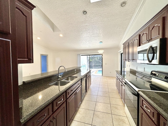 kitchen with black electric range, stainless steel microwave, ornamental molding, and a sink