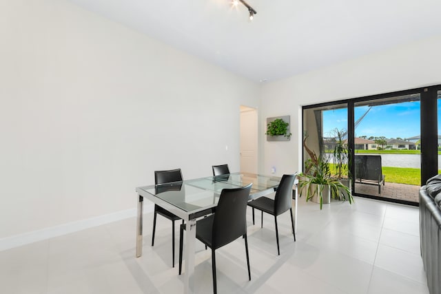 dining space with baseboards