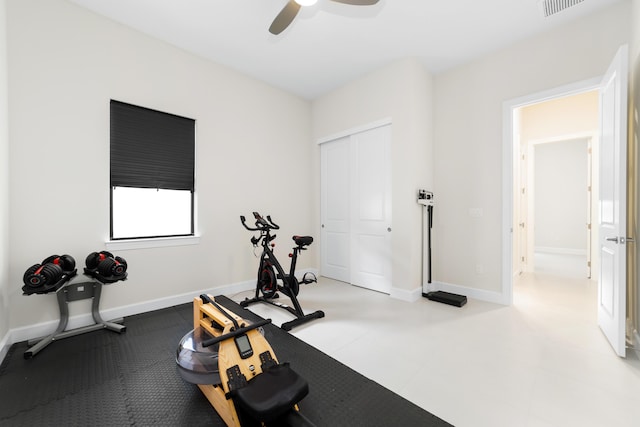 workout area featuring visible vents, baseboards, and ceiling fan