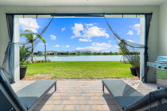 view of patio / terrace with a water view